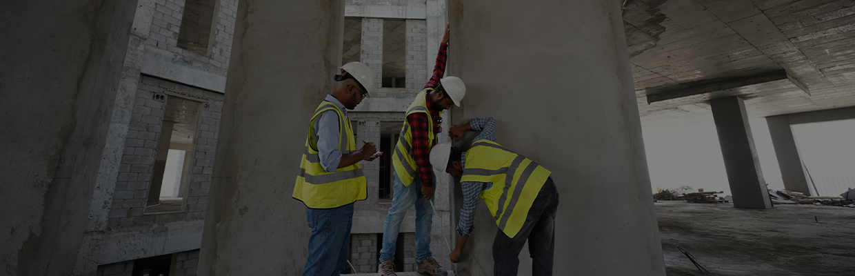 Group of people inspecting construction